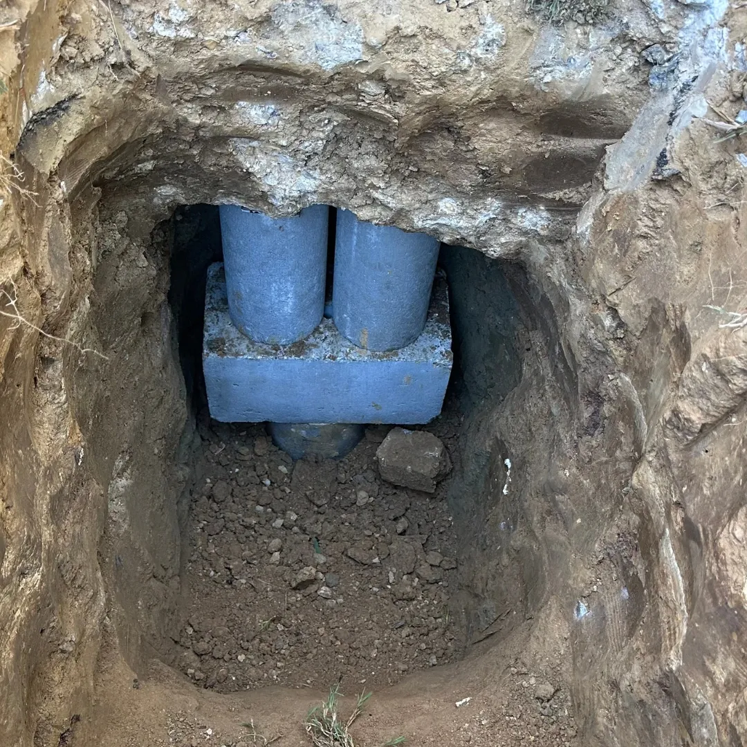 Concrete piles under a Bartlett home.