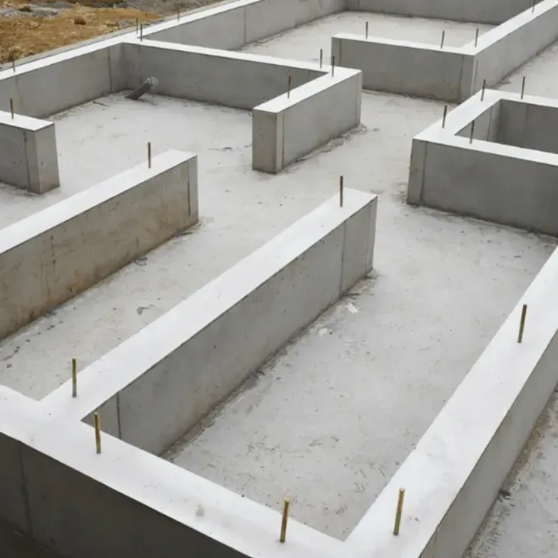 New cobstruction showing the concrete poured foundation.